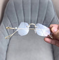 Elegant Rimless Gold Eyeglasses with Minimalist Design